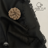 Luxury lamb fur wool shawl draped on shoulder – stylish men’s winter outfit idea